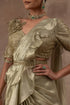 Metal green tissue drape sari with frills combined with blouse and waist belt